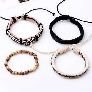 Set of four handmade bohemian beaded and braided leather bracelets with adjustable ropes