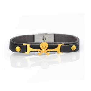Classic black leather bracelet featuring a golden skull and crossbones metal charm