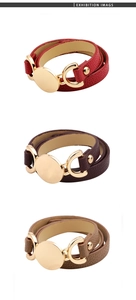 Detailed view of multi-wrap PU leather bracelets with golden round charms in three colors