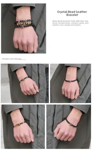 Dettaglio di un bracciale in pelle con perline, elmo spartano e pietre occhio di tigre