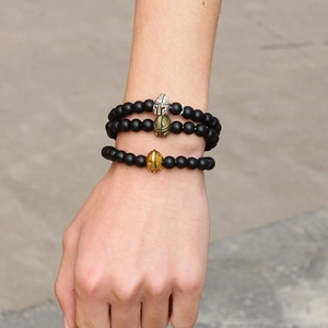 Three-piece men's beaded bracelet set featuring Spartan helmets and black matte stones