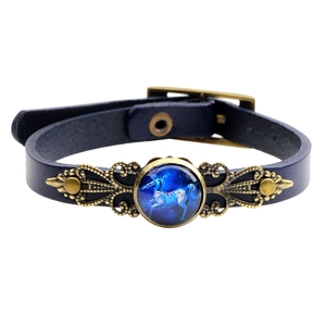 Bracelet vintage en cuir bleu foncé avec breloque zodiaque en bronze et motif étoilé