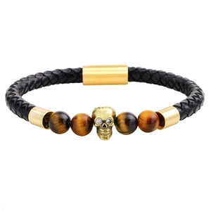 Men's black braided leather skull bracelet with tiger eye stones and gold magnetic clasp