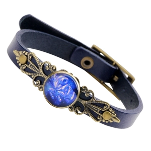 Bracelet vintage en cuir bleu foncé avec alliage de bronze sculpté et gemme bleue
