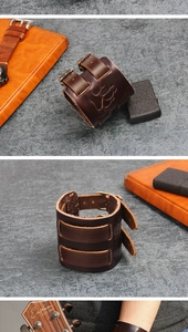 Close-up of vintage brown leather bracelet with bear paw embossing and double buckle