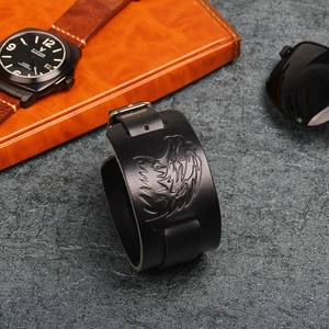 Men's vintage black leather bracelet featuring a silver eagle relief with adjustable buckle