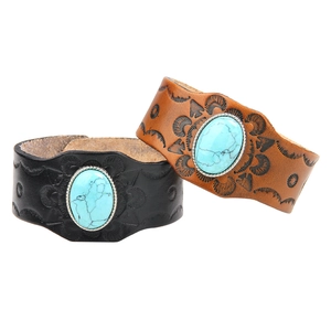 Vintage wide leather bracelet with embossed ethnic patterns and turquoise stone inlay