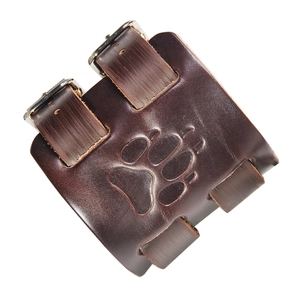 Vintage brown leather wristband with bear paw embossed pattern and adjustable buckles