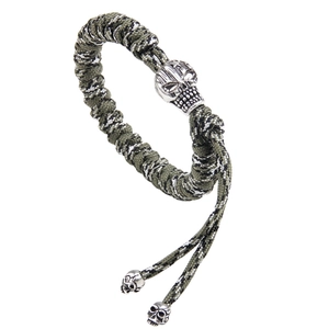 Paracord survival bracelet with camouflage pattern and metal skull charms for men