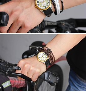 Detail of leather wrap bracelet with rudder charm and men's watch in cycling scene
