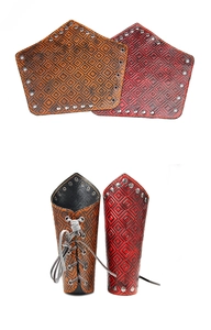 Detail of vintage embossed leather wristband with rivets and adjustable lacing design