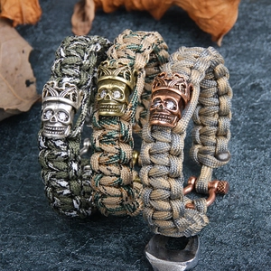 Outdoor paracord bracelet with zircon skull crown pendant and metal U-bolt shackle