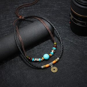 Retro turquoise munt hanger ketting met gevlochten koorden en etnische kralen