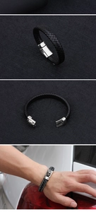 Detalle del cierre de acero de dragón en pulsera de cuero trenzado para hombre con textura