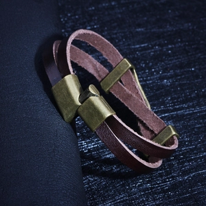 Retro multi-layer brown leather bracelet with bronze feather charms and punk style buckles