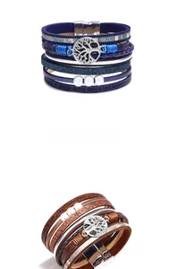Detail of multi-layer wrap bracelet with tree of life charm and magnetic buckle