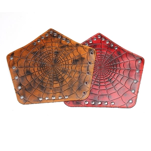Punk leather wrist guards with spider web texture and metal rivets in vintage colors