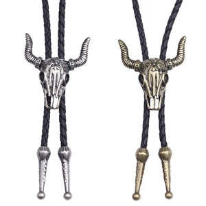 Retro cattle skull bolo ties in silver and bronze finish with black braided leather cords