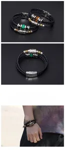 Detail of layered leather bracelet for men featuring colorful stones and magnetic clasp