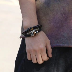 Three-piece men's bracelet set with lapis lazuli, tiger eye stones and skull charms