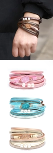 Détail du bracelet multicouche en cuir avec pierre druzy, perles et fermoir magnétique