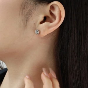 Close-up of S925 sterling silver cluster stud earrings with sparkling pavé cubic zirconia
