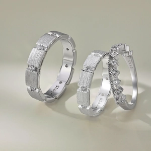 Minimalist S925 sterling silver ring set featuring matte textures and crown design