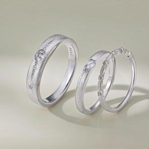 Detail of S925 sterling silver rings set with brushed matte finish and zircon inlay