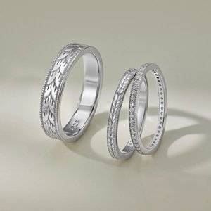 Detailed macro of S925 sterling silver set with wheat engraving and pavé crystal stones