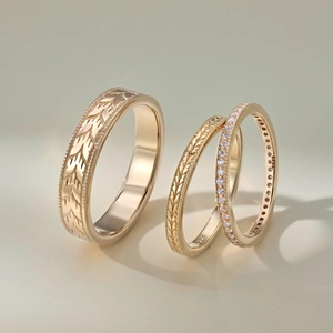 Detailed view of three-piece S925 silver ring set with wheat engraving and zircon stone