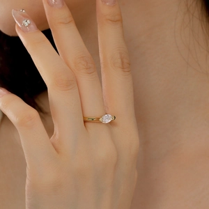 Elegant 14K gold plated S925 silver ring featuring a marquise cut sparkling gemstone