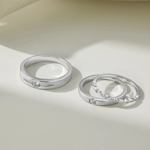 Detail of S925 sterling silver ring set showing matte finish and diamond engraving