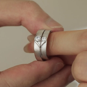 S925 sterling silver couple rings with brushed finish forming a heart when combined