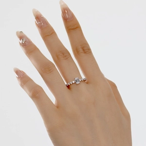 S925 sterling silver ring with emerald cut zircon and side stones on model's hand