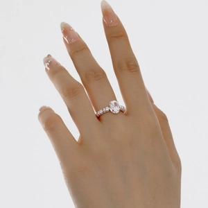 Close-up of S925 sterling silver ring featuring an oval cut zircon and pavé setting