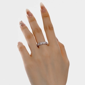 S925 sterling silver twist ring with paved zircon crystals worn on a model hand