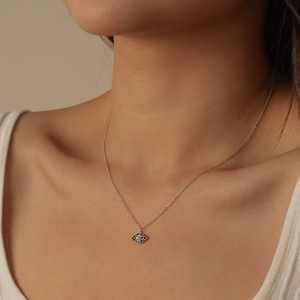 Elegant S925 silver Evil Eye necklace featuring blue zircon accents and a center pearl inlay