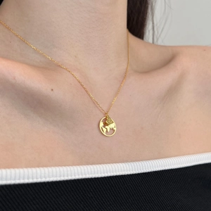 Elegant S925 sterling silver necklace with hollow world map pendant and gold heart charm