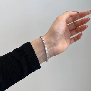 Close-up of sparkling 925 sterling silver tennis bracelet with cubic zirconia diamonds