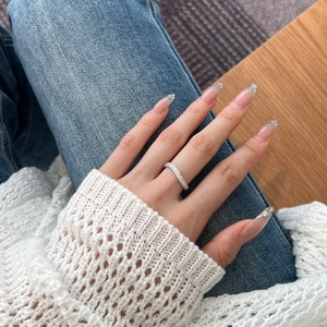 Elegant 925 sterling silver S-curve ring with double row pave zircon on finger