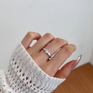 Matte S925 sterling silver ring with heart-shaped zircon stone shown on a hand