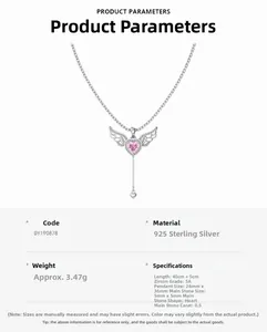Macro shot of S925 sterling silver angel wing necklace with pink heart-shaped zircon pendant