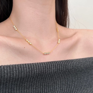 Elegant 18K gold-plated S925 sterling silver necklace with three round cubic zirconia stones