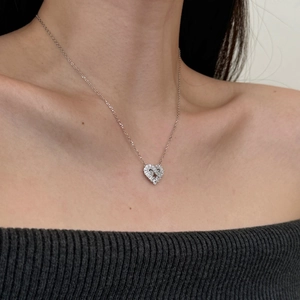 Elegant S925 sterling silver heart necklace with zircon pave on female model