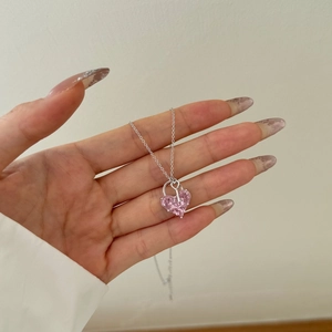 Elegant S925 sterling silver necklace featuring a pink heart-cut gemstone pendant