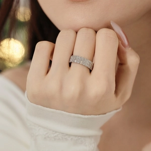 Exquisite S925 sterling silver ring featuring four rows of sparkling cubic zirconia stones