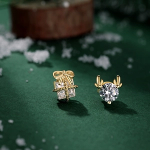 Detailed close-up of S925 silver antler and gift box earrings with cubic zirconia
