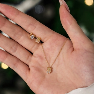 Exquisite gold reindeer and gift box jewelry set for Christmas with sparkling crystals