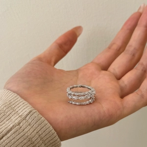 Three-layer S925 sterling silver ring featuring marquise and round cut cubic zirconia