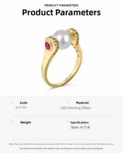 Macro shot of S925 sterling silver ring with large white pearl and ruby accents
